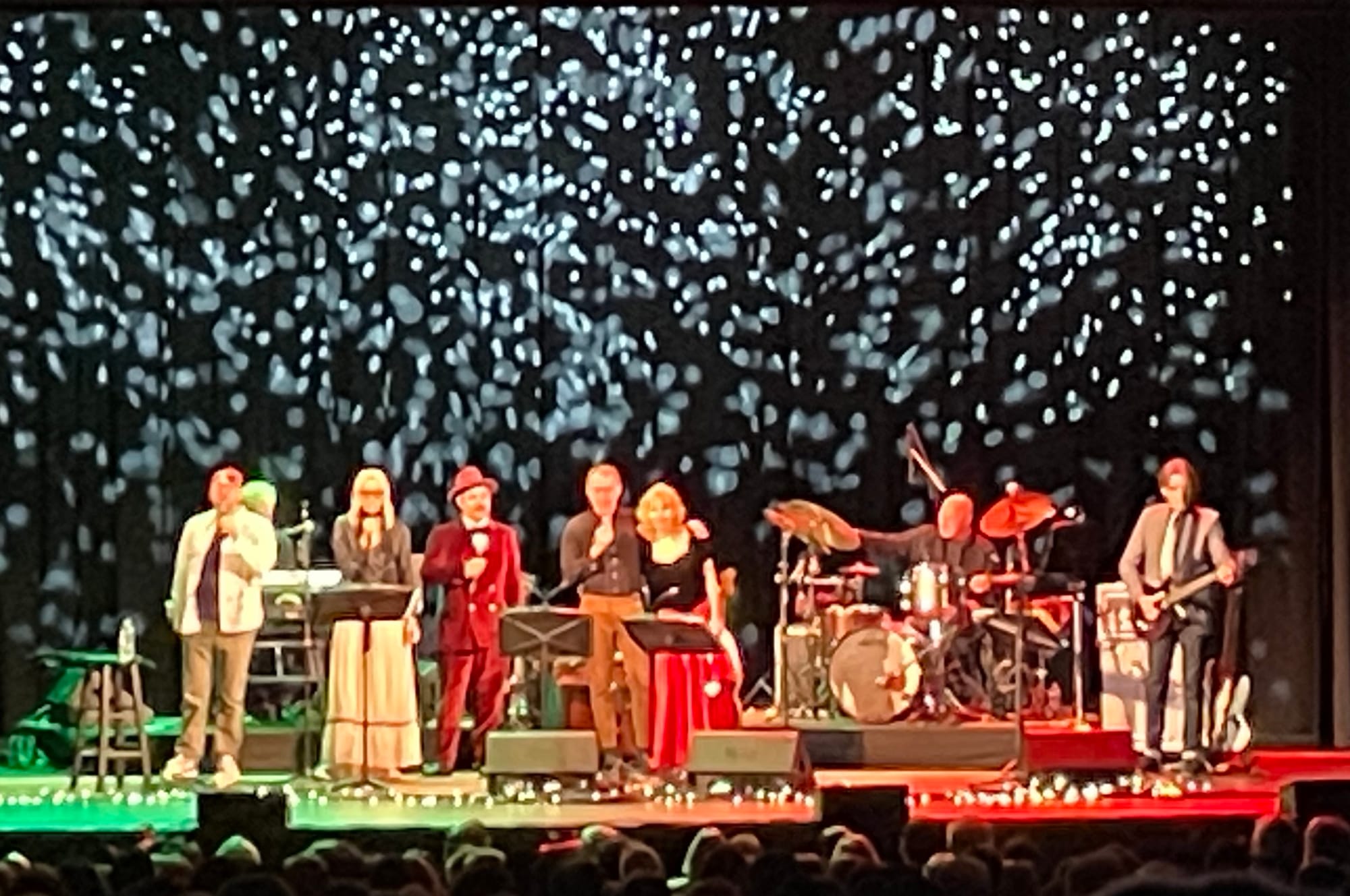 Cast/band of the Aimee/Ted Christmas Show onstage during the finale. It's blurry.