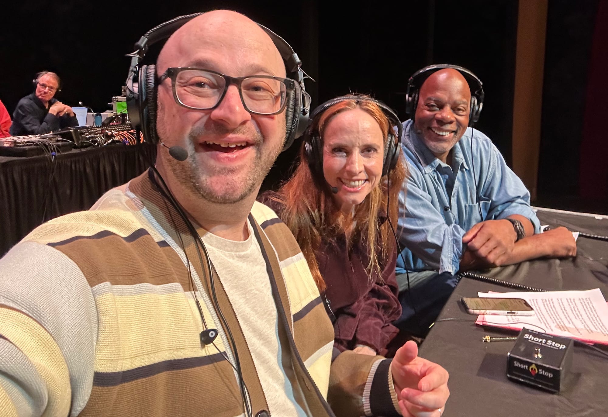 Me, Faith, and Alonzo at the panelist table. Robert Newhaus is in the back at the producer table.