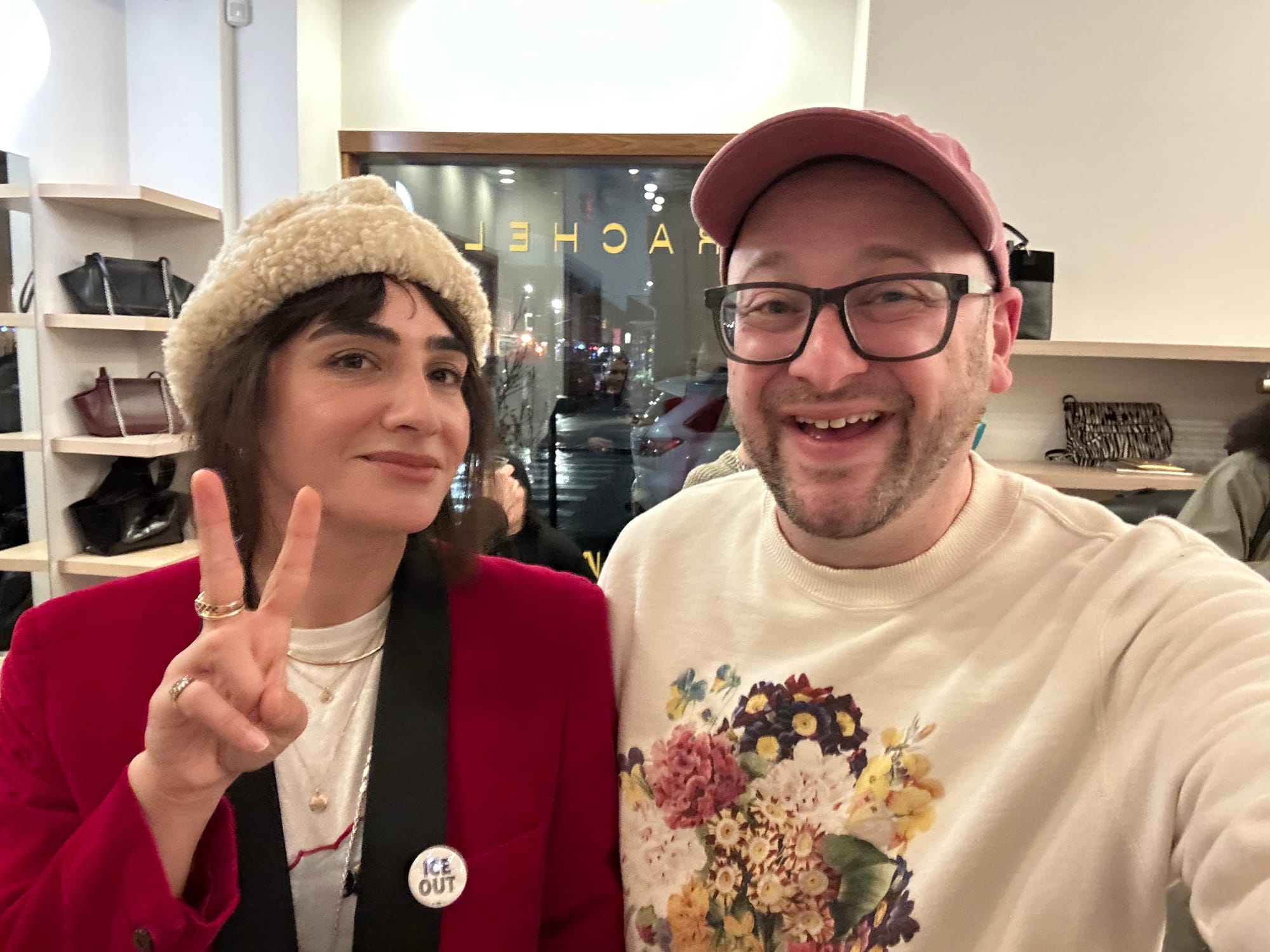 Amil in cool red blazer and fleece hat standing with me (wearing a sweatshirt) at the Rachel Comey store in Brooklyn.
